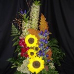 Gentians and Sunflowers in a ceramic pot arrangement